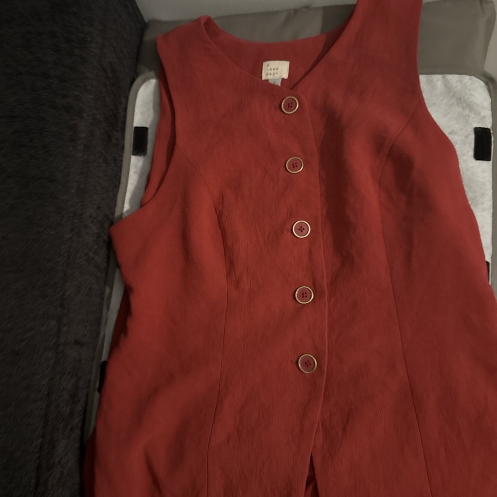 Red Sleeveless Button-Up Top